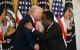 US President Donald Trump shakes hands with Leo Terrell