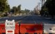 Roads remain closed after residents were evacuated following a chemical leak from a large storage tank that threatened nearby homes in Garden Grove, California, on May 24, 2026. Authorities in California on May 24 said they discovered a crack in a damaged tank of toxic chemicals, potentially relieving pressure as the threat of an explosion has forced tens of thousands of residents to evacuate. About 50,000 residents were ordered to leave their homes in the Garden Grove area of Orange County, southeast of Los Angeles, on Friday after the tank began to leak, sending fumes over a heavily populated area about five miles from Disneyland. (Photo by Blake Fagan / AFP)