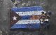 Un mosaico de la bandera cubana deshecha por el tiempo (Archivo)