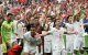 Moroccan players celebrate after their victory over Canada/ Ronaldo Schemidt