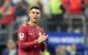 El delantero portugués Cristiano Ronaldo, número 07, reacciona tras la derrota en el partido de octavos de final