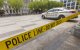 Police car vehicle of United States Secret Service and POLICE LINE- DO NOT CROSS ribbon.