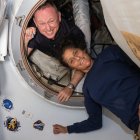 This undated handout picture from Nasa released on July2, 2024 shows NASAs Boeing Crew Flight Test astronauts (from top) Butch Wilmore and Suni Williams inside the vestibule between the forward port on the International Space Stations Harmony module and Boeing's Starliner spacecraft. - The first astronauts to fly Boeing's troubled Starliner are definitely not "stranded" at the International Space Station, NASA insisted on June 28, 2024 despite having no clear timeframe for bringing them home. In an unusually defensive press call, officials attempted to put a positive spin on where things currently stood after weeks of negative headlines due to the spaceship's delayed return. (Photo by Handout / NASA / AFP) / RESTRICTED TO EDITORIAL USE - MANDATORY CREDIT "AFP PHOTO / NASA" - NO MARKETING NO ADVERTISING CAMPAIGNS - DISTRIBUTED AS A SERVICE TO CLIENTS