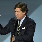 US political commentator Tucker Carlson speaks during the last day of the 2024 Republican National Convention at the Fiserv Forum in Milwaukee, Wisconsin, on July 18, 2024. - Donald Trump will get a hero's welcome Thursday as he accepts the Republican Party's nomination to run for US president in a speech capping a convention dominated by the recent attempt on his life. (Photo by ANDREW CABALLERO-REYNOLDS / AFP)