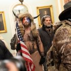 Jake Angeli the QAnon Shaman joins protesters as they storm the Capitol