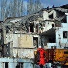 Rescuers remove the rubble at an alartment block hit by the Russian missile on the night of March 2, 2023, Zaporizhzhia, southeastern Ukraine.