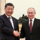 China's President Xi Jinping and his Russian counterpart Vladimir Putin shake hands during a meeting at the Moscow Kremlin.