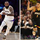 LeBron James, jugador de Los Ángeles Lakers, y Devin Booker, jugador de Phoenix Suns, durante el tercer partido de las semifinales de los Playoffs de la NBA 2023.