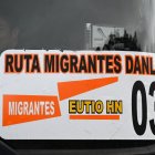 A Chinese migrant man is seen on board a bus that will take him to the border between Honduras and Guatemala and continue his route to the US, in Tegucigalpa on August 24, 2023. According to the National Institute of Migration, more than 222,000 migrants entered the country in the last eight months