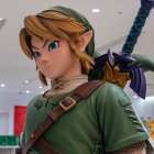 This photo taken on May 8, 2023 shows a display (R) for Japanese gaming giant Nintendo's long-running "Legend of Zelda" game series, at the company's official store in Tokyo's Shibuya district. Nintendo, who will report net annual earnings later on May 9, will also release the latest instalment in its long-running "Legend of Zelda" game series, titled "Tears of the Kingdom", for the Switch on May 12. (Photo by Richard A. Brooks / AFP)