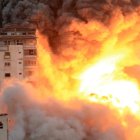 October 7, 2023, Gaza city, Gaza Strip, Palestinian Territory: Smoke and flames billow after Israeli forces struck a high-rise tower in Gaza City, October 7, 2023. Palestinian militants have begun a ''war'' against Israel which they infiltrated by air, sea and land from the blockaded Gaza Strip, Israeli officials said, a major escalation in the Israeli-Palestinian conflict (Credit Image: © Ali Hamad/APA Images via ZUMA Press Wire)