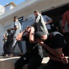 Gaza City, Gaza Strip, Palestinian Territory: Mourners carry the bodies of dead Palestinians