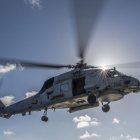 An MH-60R Seahawk, attached to the “Saberhawks” of Helicopter Maritime Strike Squadron (HSM) 77 conducts vertical replenishment training aboard the guided-missile cruiser USS Shiloh (CG 67).