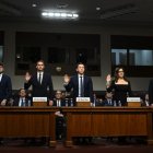 Jason Citron, CEO of Discord; Evan Spiegel, CEO of Snap; Shou Zi Chew, CEO of TikTok; Linda Yaccarino, CEO of X; and Mark Zuckerberg, CEO of Meta, are sworn in before testifying during the US Senate Judiciary Committee hearing, "Big Tech and the Online Child Sexual Exploitation Crisis," in Washington, DC, on January 31, 2024.