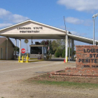 The entrance to the Louisiana State Penitentiary - The placard says "Louisiana State Penitentiary" and "Warden Burl Cain"