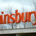 File photo dated 18/03/14 of a sign for Sainsbury's supermarket. The supermarket has notched up a rise in first-quarter sales as solid grocery demand offset ongoing weak trading across its general merchandise and Argos businesses. Issue date: Tuesday July 2, 2024.