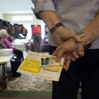 Seniors line up for early voting Friday at The Summit assisted living center in Austin, Texas in advance of Tuesday's general election that will decide the President of the United States and many other races. Participation was high as dozens lined the hallways to cast their electronic  ballots - October 26, 2012. ©Bob Daemmrich / The Image Works