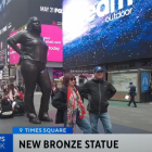 La estatua en el Times Square