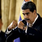 Venezuela's President Nicolas Maduro gestures as he speaks during a meeting at the National Assembly in Caracas on August 22, 2025. Venezuela's President Nicolás Maduro on August 22, 2025, denounced the US military deployment in Caribbean waters as an immoral, criminal, and illegal plan against his country, seeking regime change. (Photo by Juan BARRETO / AFP)