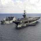 In this October 18, 2015 US Navy handout photo,The aircraft carrier USS Theodore Roosevelt (CVN 71) pulls alongside the Indian Deepak-class fleet tanker INS Shakti (A 57) during a replenishment-at-sea exercise as a part of Exercise Malabar 2015. Malabar is a continuing series of complex, high-end war fighting exercises conducted to advance multi-national maritime relationships and mutual security. AFP PHOTO / HANDOUT  / US NAVY / MCS CHAD M. TRUDEAU           == RESTRICTED TO EDITORIAL USE / MANDATORY CREDIT: "AFP PHOTO / HANDOUT / US NAVY / MCS CHAD M. TRUDEAU  "/ NO MARKETING / NO ADVERTISING CAMPAIGNS / DISTRIBUTED AS A SERVICE TO CLIENTS == (Photo by MCS CHAD M. TRUDEAU / US NAVY / AFP)