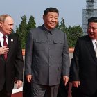 In this pool photograph distributed by the Russian state agency Sputnik, (L-R) Russia's President Vladimir Putin walks with China's President Xi Jinping and North Korea's leader Kim Jong Un before a military parade marking the 80th anniversary of victory over Japan and the end of World War II, in Beijings Tiananmen Square on September 3, 2025. (Photo by Alexander KAZAKOV / POOL / AFP)
