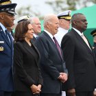 (Front L-R) Incoming Chairman of the Joints Chiefs of Staff, Air Force General Charles Brown; US Vice President Kamala Harris; President Joe Biden; Defense Secretary Lloyd Austin and retiring Chairman, Army General Mark Milley.
