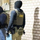 U.S. Immigration and Customs Enforcement officers wait to detain a person, Monday, Jan. 27, 2025, in Silver Spring, Md. (AP Photo/Alex Brandon)