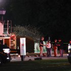 Agentes del Equipo de Respuesta a Evidencias del FBI trabajan fuera de la Iglesia de Jesucristo de los Santos de los Últimos Días en Grand Blanc, Míchigan, el 28 de septiembre de 2025. Cuatro personas murieron y varias más resultaron heridas el 28 de septiembre después de que un tirador atacara una iglesia mormona en Míchigan, según informaron las autoridades, en la última tragedia mortal que el presidente de Estados Unidos, Donald Trump, calificó como parte de una «epidemia de violencia» nacional. El sospechoso, un hombre de 40 años de una localidad cercana en el norte del estado, fue abatido por las fuerzas del orden que respondieron al ataque, en el que también se incendió la iglesia, según informó la policía, sin especificar ningún posible motivo.