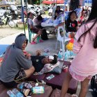 Personas reciben tratamiento en el hospital de la ciudad de Bogo.