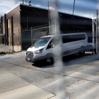 A van exits the Broadview Immigration and Customs Enforcement (ICE) facility amid heightened federal security following US President Donald Trumps order to expand federal presence and intensify immigration enforcement in Chicago through the Department of Homeland Security in Broadview, Illinois, on October 2, 2025. US President Donald Trump, who campaigned on a pledge to deport large numbers of migrants, has encouraged authorities to be more aggressive as he seeks to hit his widely reported target of one million deportations annually. (Photo by OCTAVIO JONES / AFP)