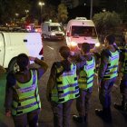 Vehículos que transportaban los cuerpos de cuatro rehenes