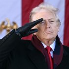 US President Donald Trump salutes at the conclusion of a Veterans Day ceremony