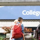 Students strolling on college campus. File archive