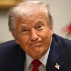 US President Donald Trump reacts during a roundtable discussion in the Roosevelt Room of the White House in Washington, DC, on December 10, 2025. (Photo by ANDREW CABALLERO-REYNOLDS / AFP)