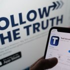 "Truth Social", with it's website on a computer