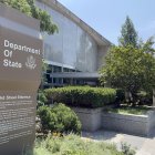 A sign pointing at the United States Department of State (Files)