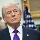 US President Donald Trump looks on as he makes an announcement in the Roosevelt Room of the White House in Washington, DC on February 12, 2026. President Donald Trump on Thursday revoked a landmark scientific finding that underpins US regulations aimed at curbing planet-warming pollution, marking the administration's most far-reaching rollback of climate policy to date. (Photo by SAUL LOEB / AFP)