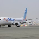 A Fly Dubai Boeing 737 Max taxis at Dubai International Airport in Dubai