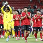South Korea's players celebrate afterb beating the Czech Republic/ ULISES RUIZ