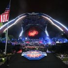 Fireworks go off as America's Justin Gaethje celebrates after defeating Georgia's Ilia Topuria during "UFC Freedom 250"