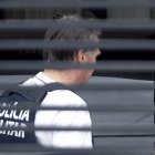 Jair Bolsonaro llegando a su casa con un chaleco antibalas tras ser dado de alta del hospital DF Star en Brasilia el 27 de marzo de 2026.