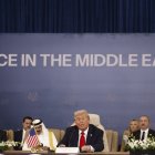 US President Donald Trump (C) delivers a speech during the Gaza Peace Summit in Sharm El-Sheikh