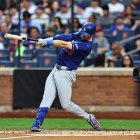 Los Angeles Dodgers player Kyle Tucker #23 hits a solo home run during the third inning of a baseball game against the New York Mets at Citi Field in Corona, New York, on July 25, 2026. (Photo by Gordon Donovan/NurPhoto) (Photo by Gordon Donovan / NurPhoto via AFP)