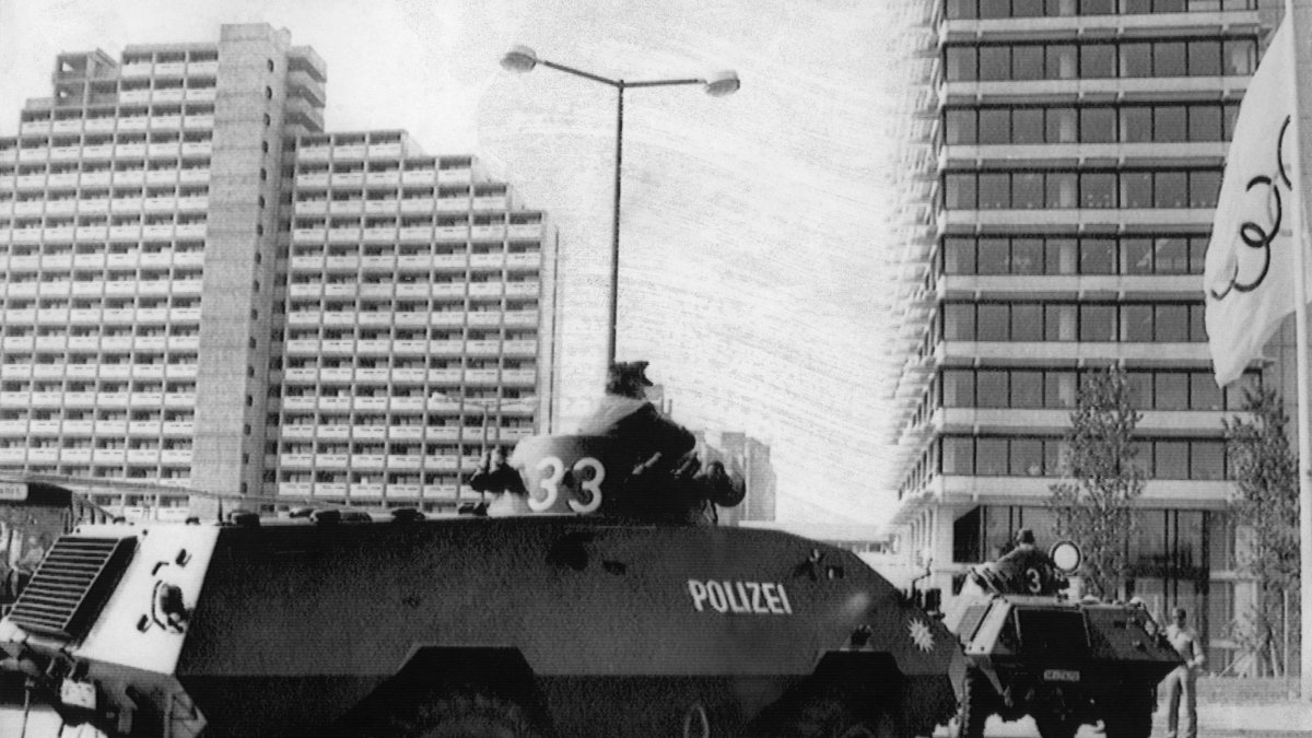 West German armored vehicles enter the Olympic Village during the Munich massacre.