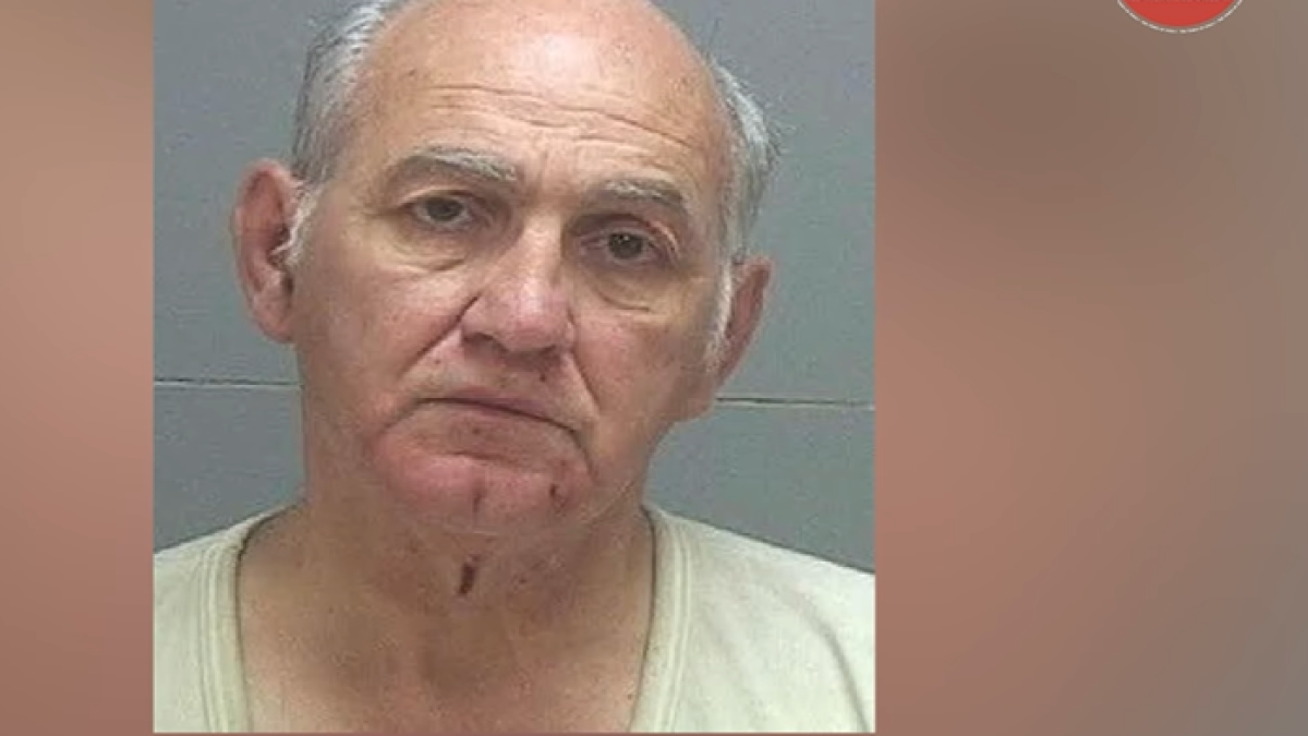 Zinn after being arrested/ Edit from screenshot.