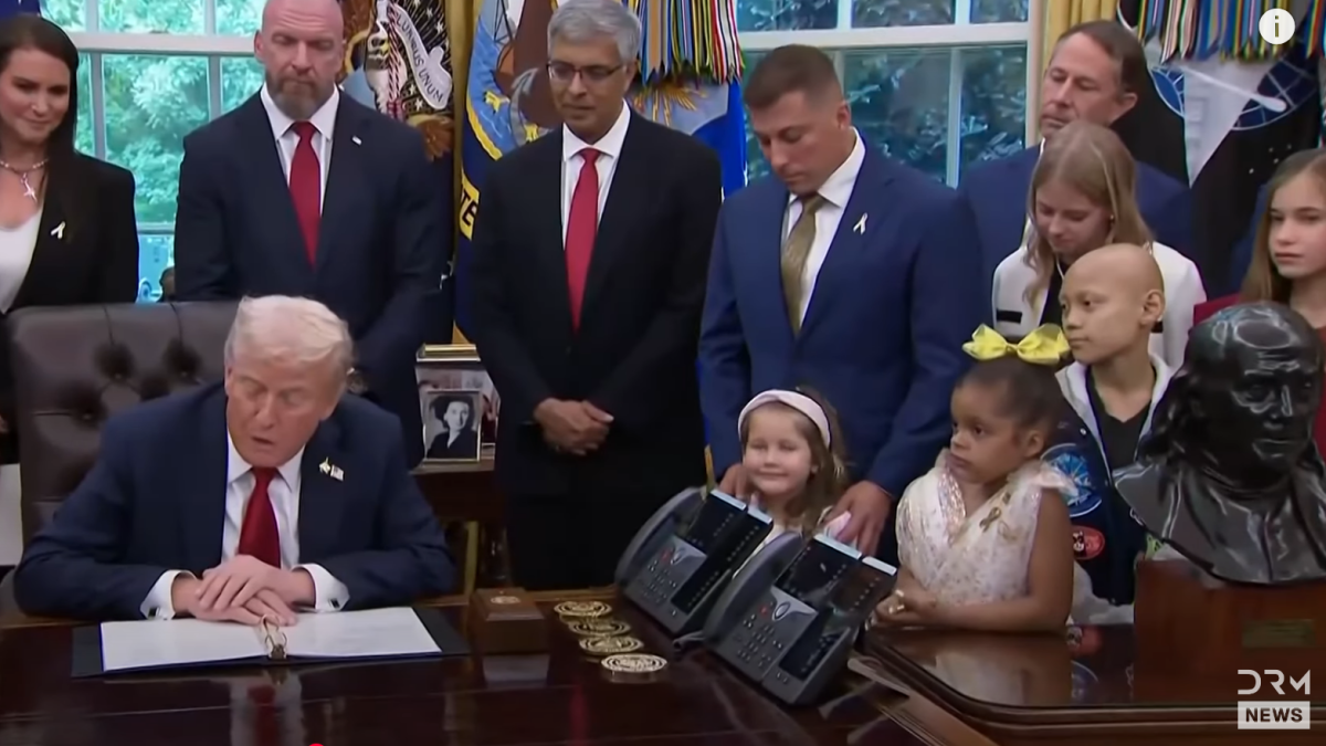 President Trump signs executive order surrounded by children battling the disease