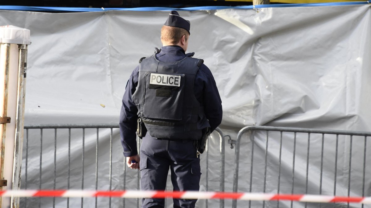 A policeman in front of the Bataclan theatre, one of the sites of the attacks.
