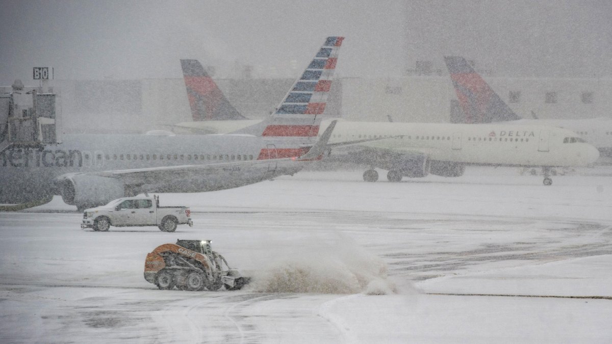 The snowstorm has led to canceled flights at the airport in Boston.