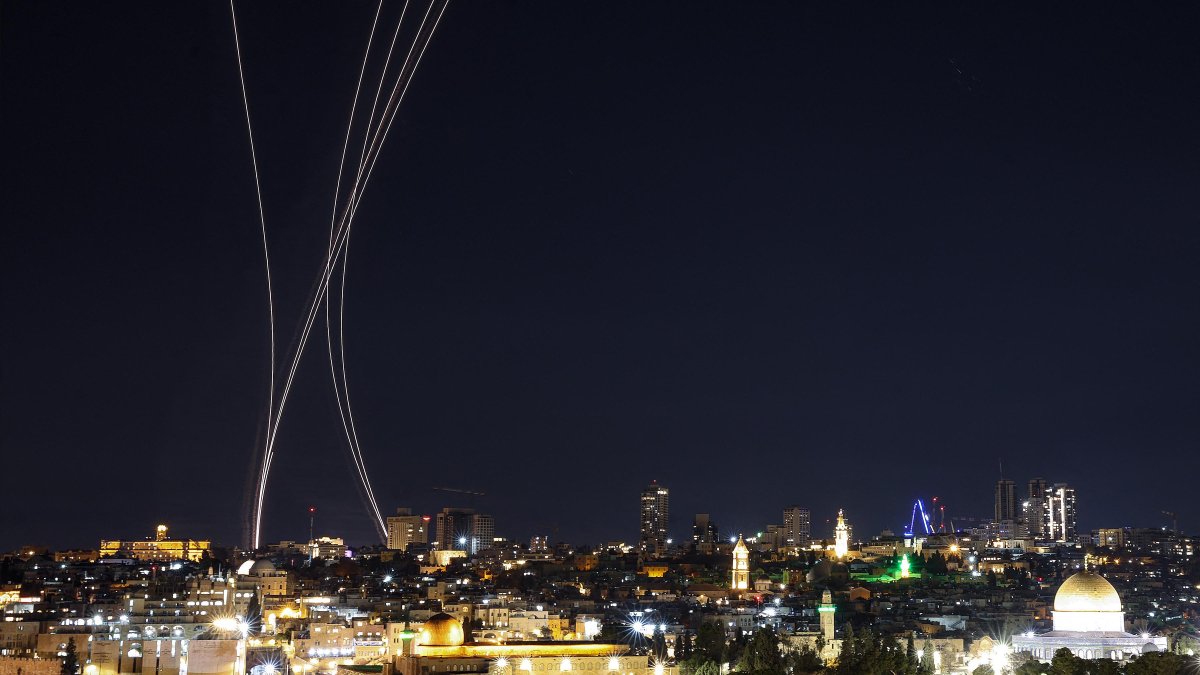 Israeli Iron Dome intercepts Iranian missiles.