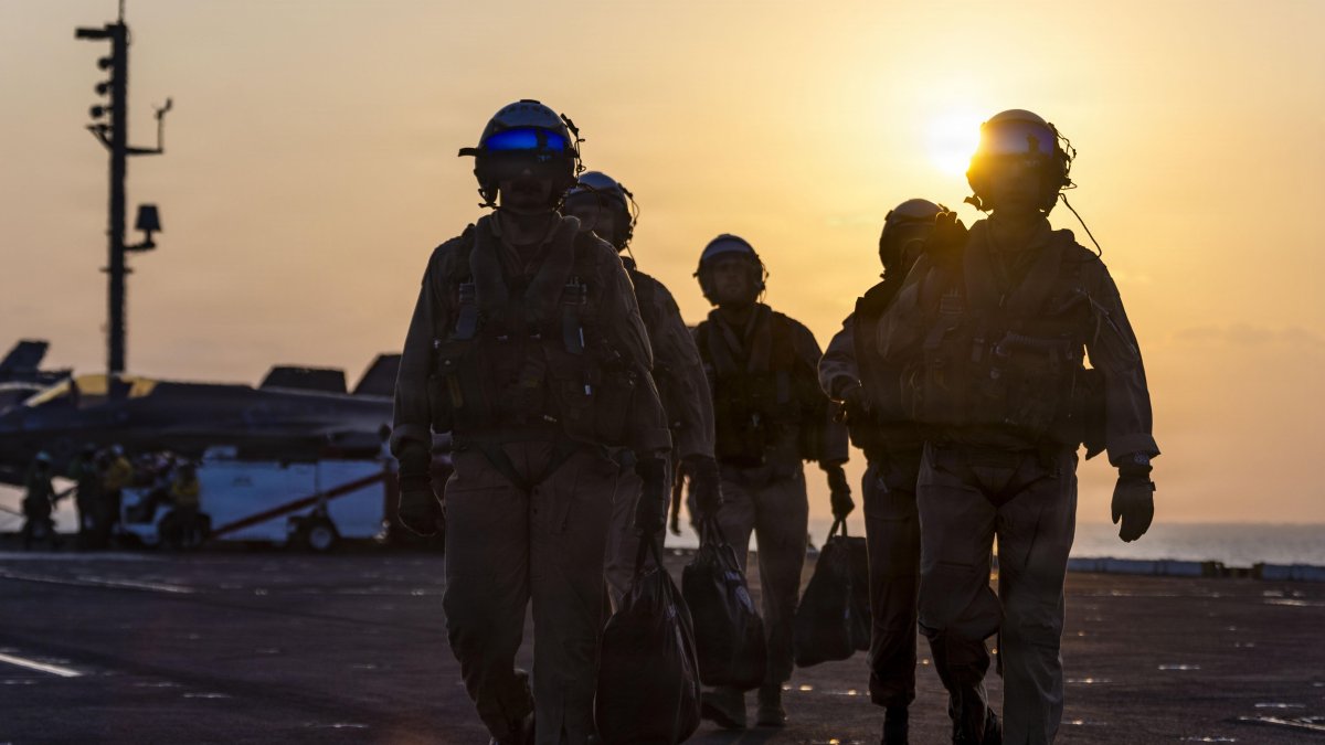 U.S. sailors on the deck of the USS Abraham Lincoln.